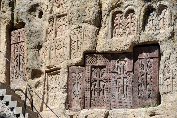 Symphony of Stones, Garni, Geghard, photo stop at Charents arch - Geghard shows Christianity carved into the rock